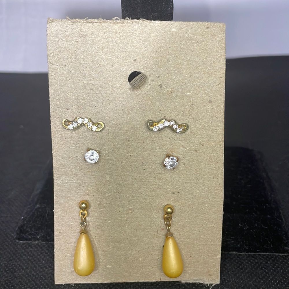Three sets of earrings